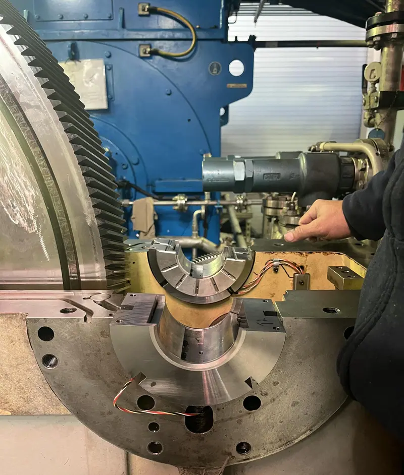 Split gearbox with the bull gear and journal bearing exposed
